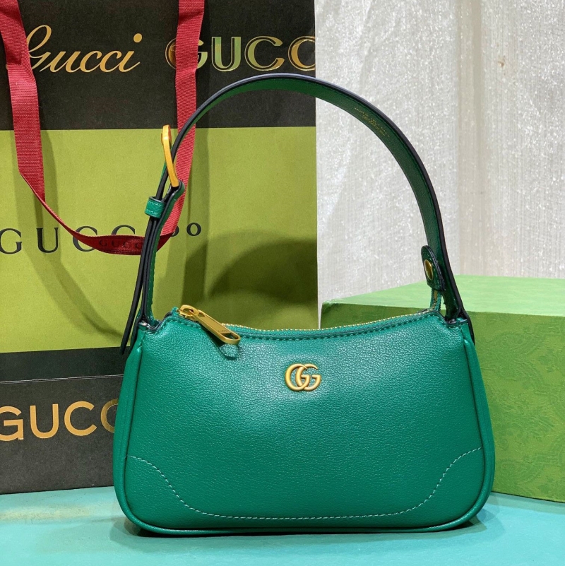 G*u*i top handle bags